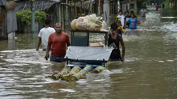 Assam Flood: উত্তরবঙ্গের প্রাকৃতিক বিপর্যয়ের পাশাপাশি বন্যার মুখে আসাম, সবচেয়ে বেশি ক্ষতিগ্রস্ত করিমগঞ্জ